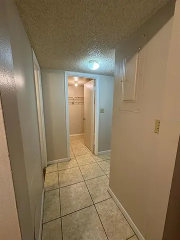 a view of hallway with shower