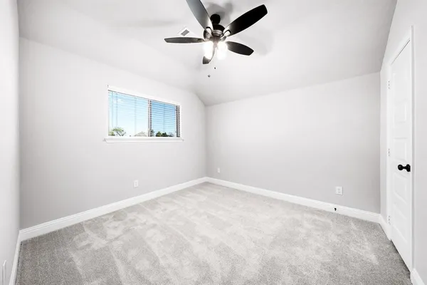 a white toilet sitting next to a bath tub
