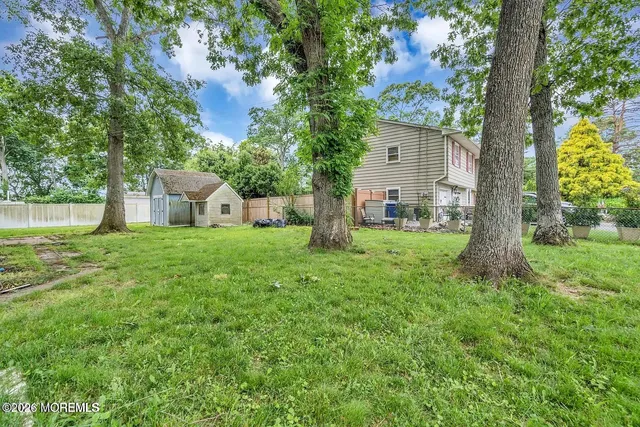a house view with a sitting space and garden view