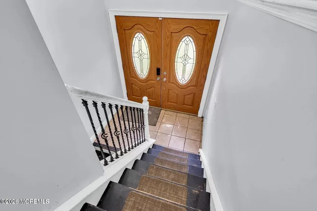 a view of a entryway with wooden floor