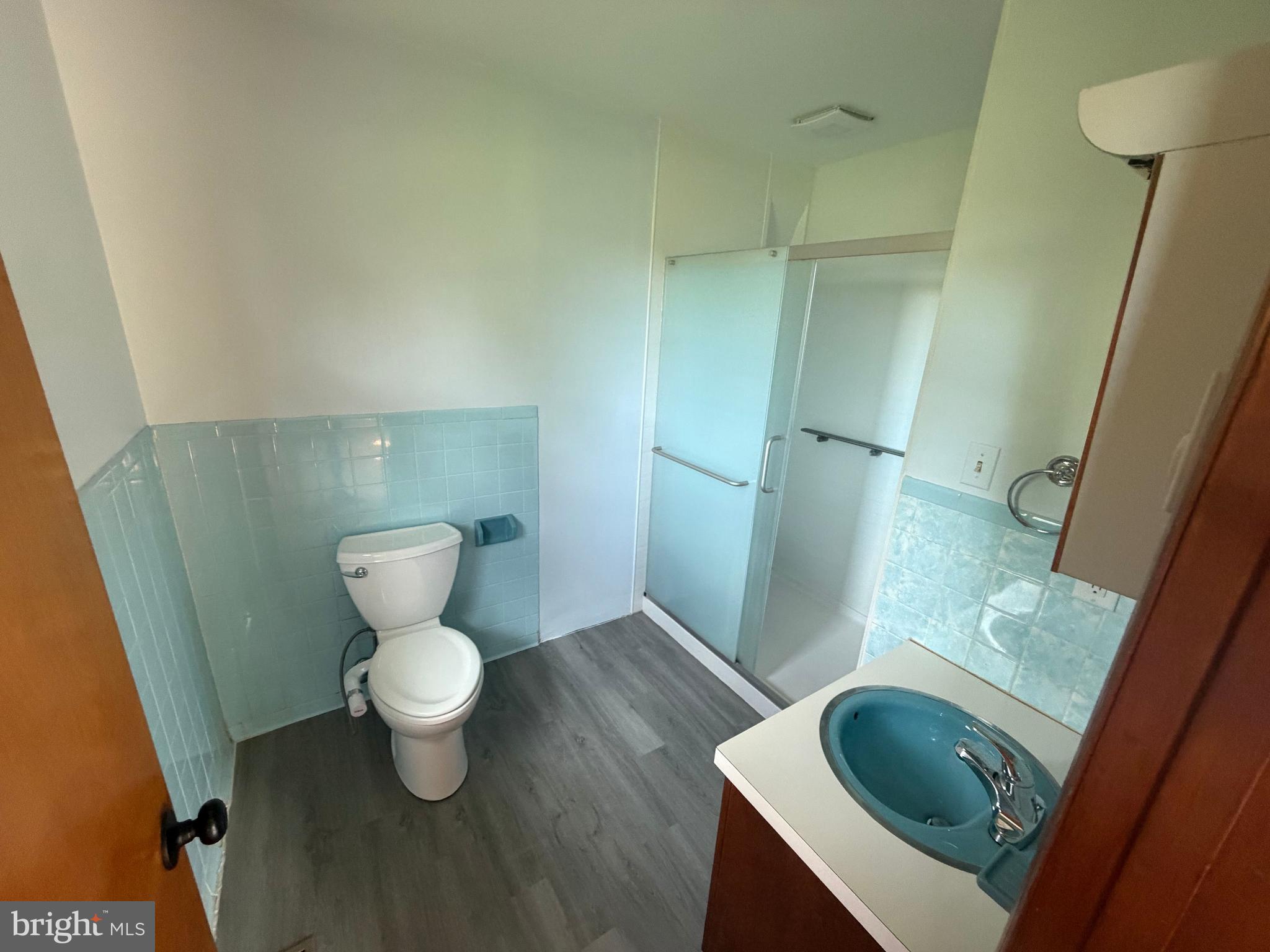 116 Rehoboth Lane Summit Point, WV 25446 - Photo 11 of 14 a bathroom with a sink and a toilet