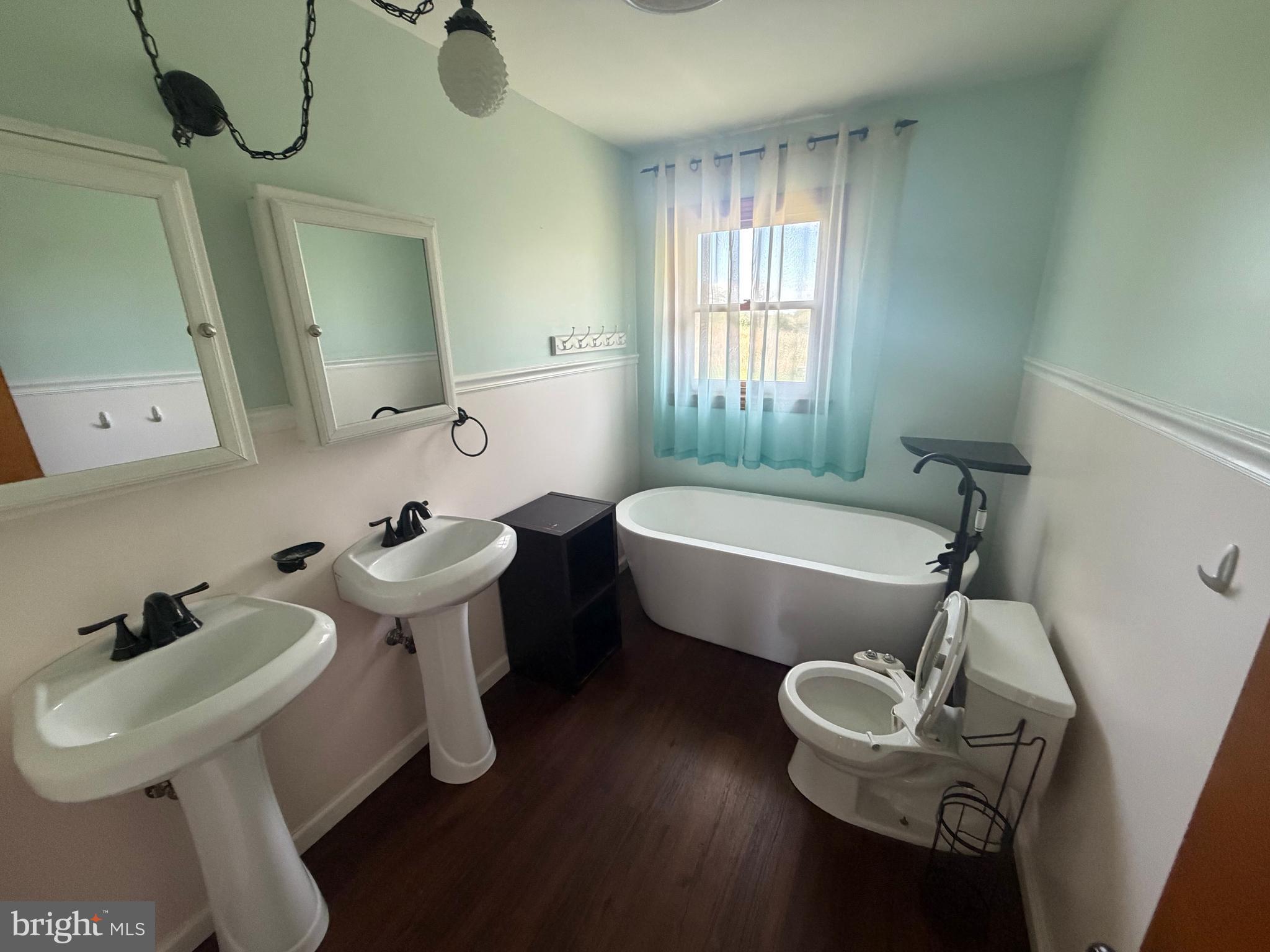 116 Rehoboth Lane Summit Point, WV 25446 - Photo 12 of 14 a bathroom with a sink a toilet and bathtub