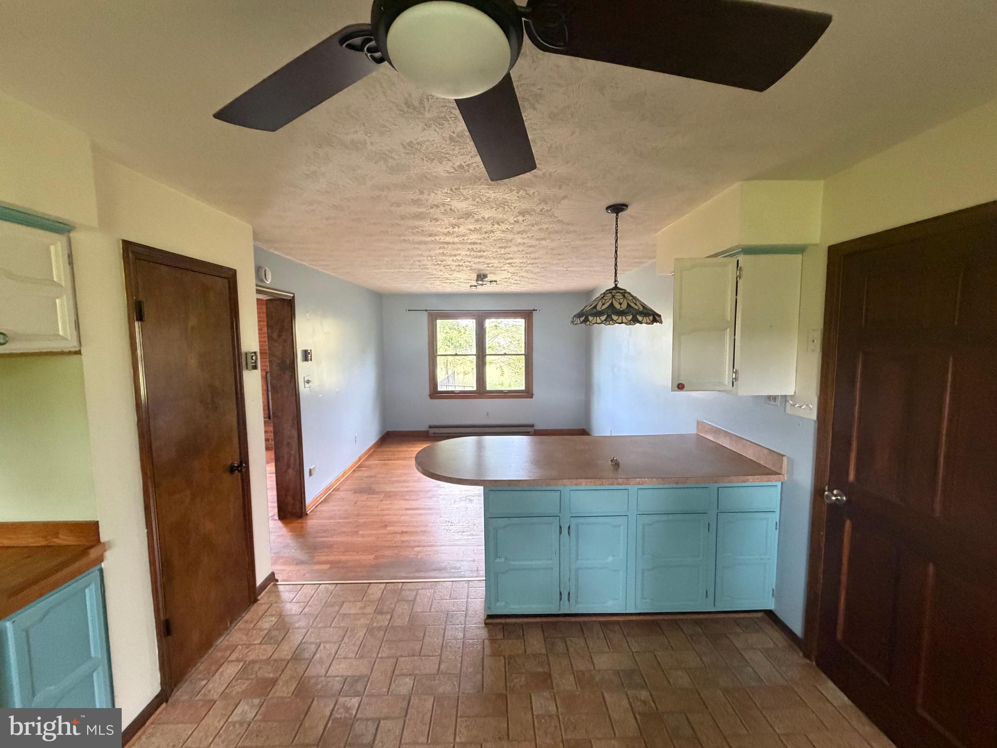 116 Rehoboth Lane Summit Point, WV 25446 - Photo 6 of 14 a kitchen with sink and refrigerator