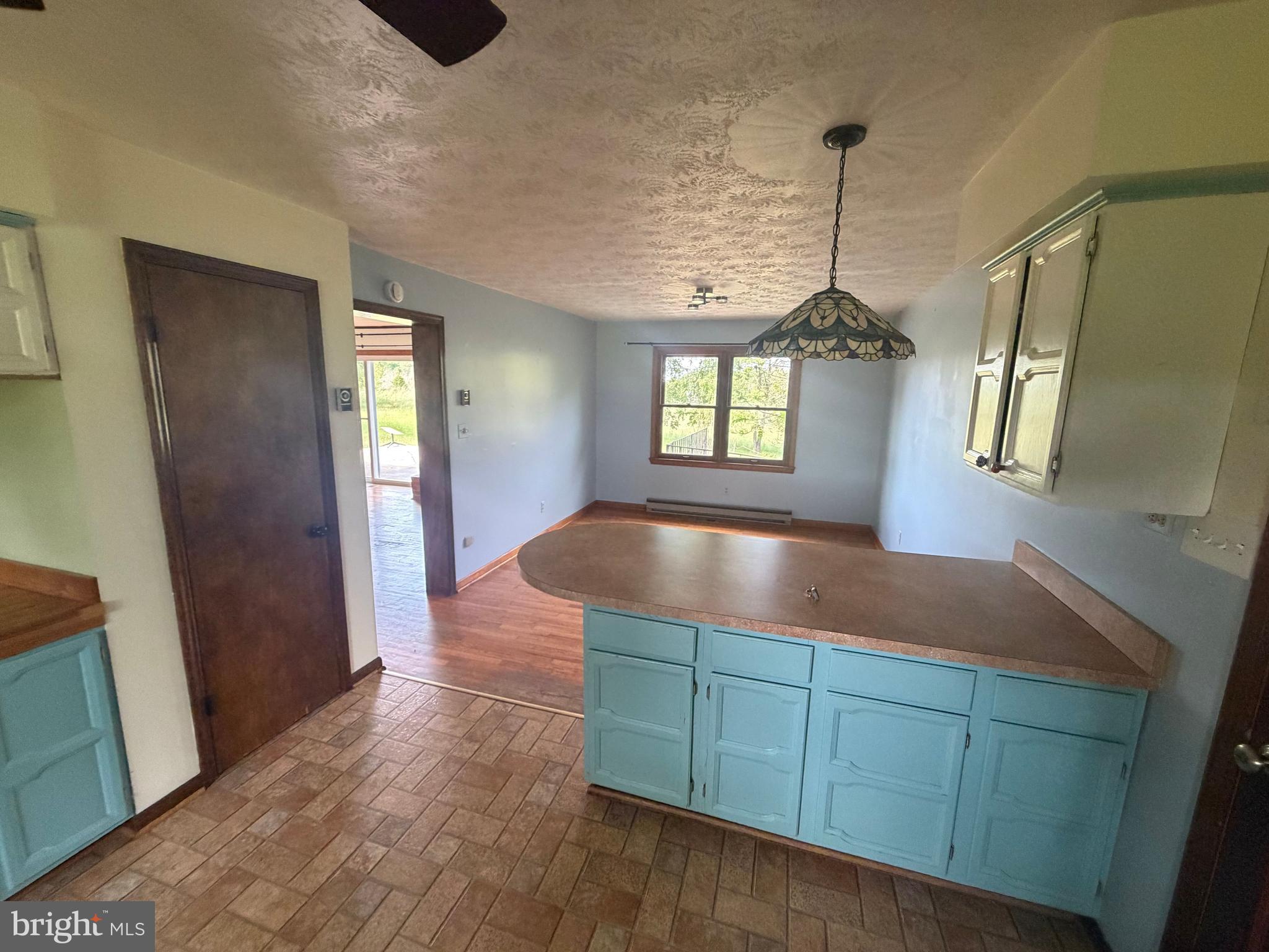116 Rehoboth Lane Summit Point, WV 25446 - Photo 7 of 14 a room with window and wooden floor
