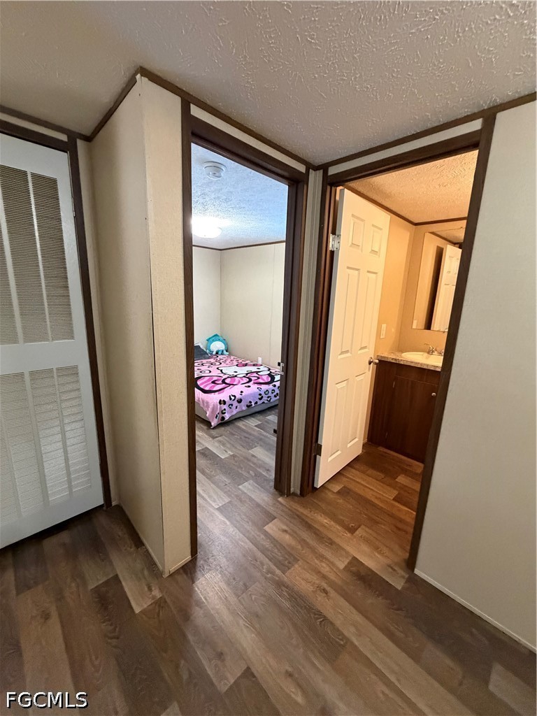 631 Stanton Street Clewiston, FL 33440 - Photo 17 of 24 a view of a room with wooden floor and chair