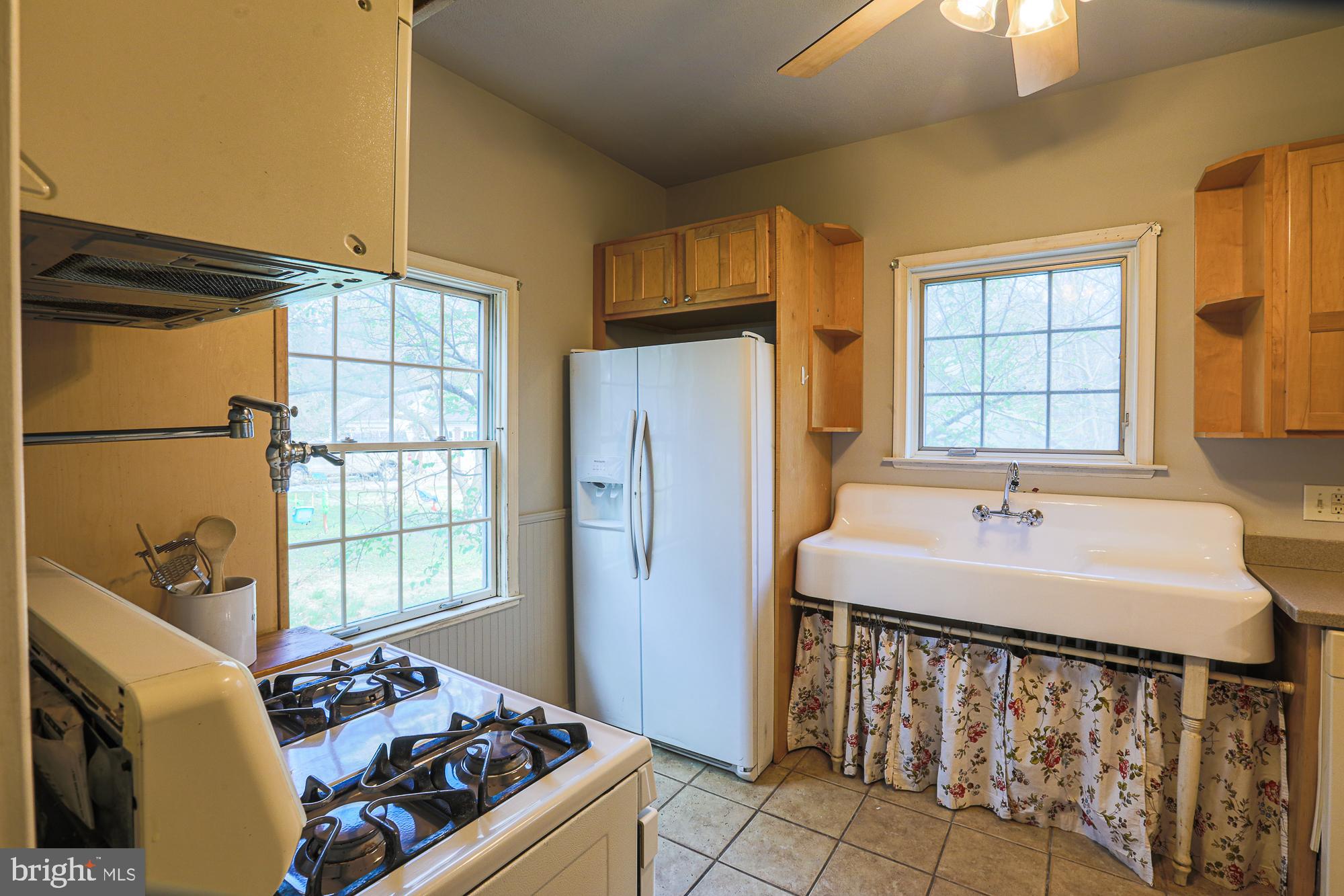 425 Nottingham Road Baltimore, MD 21229 - Photo 24 of 70 Kitchen with original porcelain sink + pot faucet