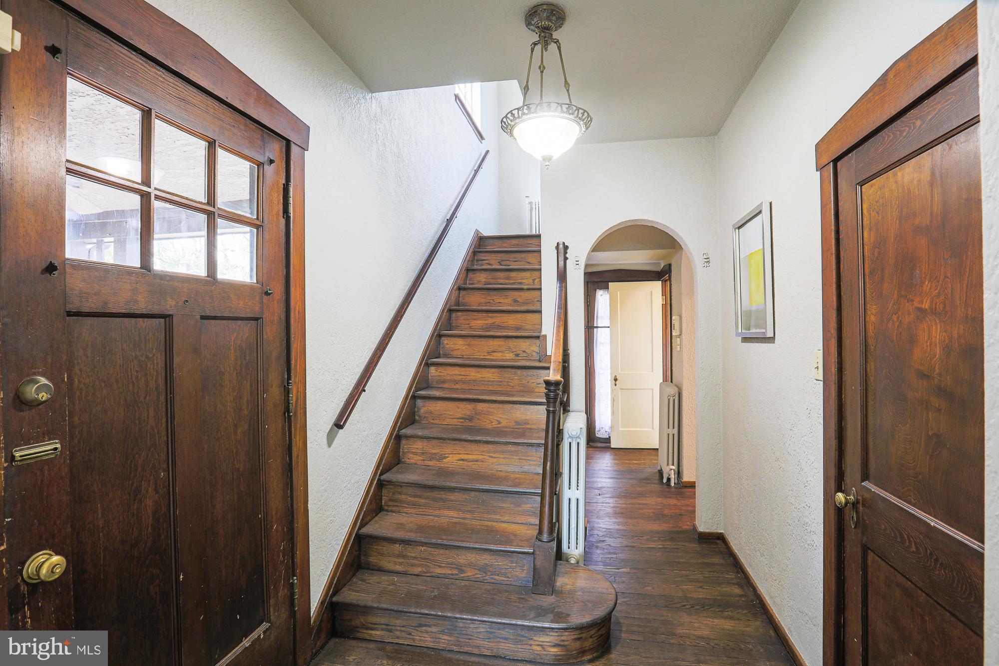 425 Nottingham Road Baltimore, MD 21229 - Photo 29 of 70 Entry and hall to 1/2 bath