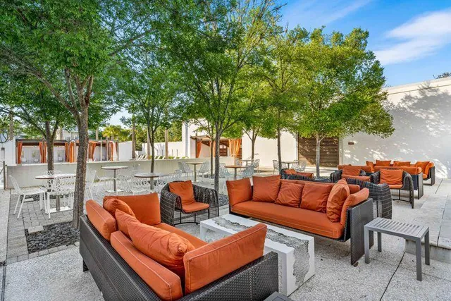 a outdoor living space with furniture and garden view