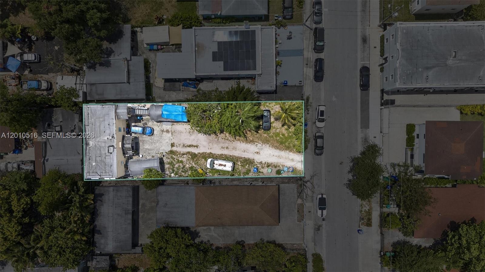 244 Northwest 32nd Street Miami, FL 33127 - Photo 2 of 9 an aerial view of a house with a yard