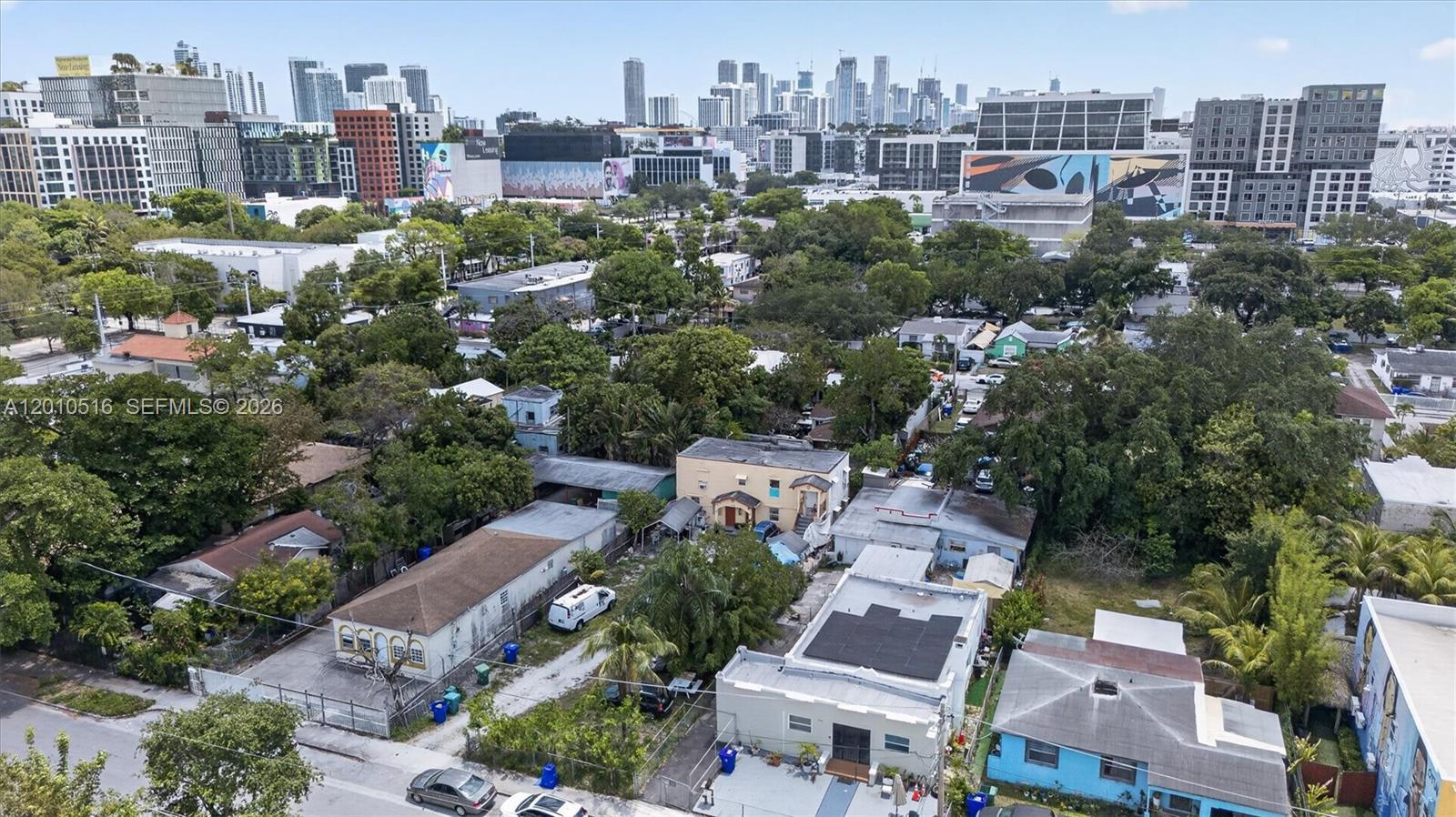 244 Northwest 32nd Street Miami, FL 33127 - Photo 4 of 9 an aerial view of a city with lots of residential buildings