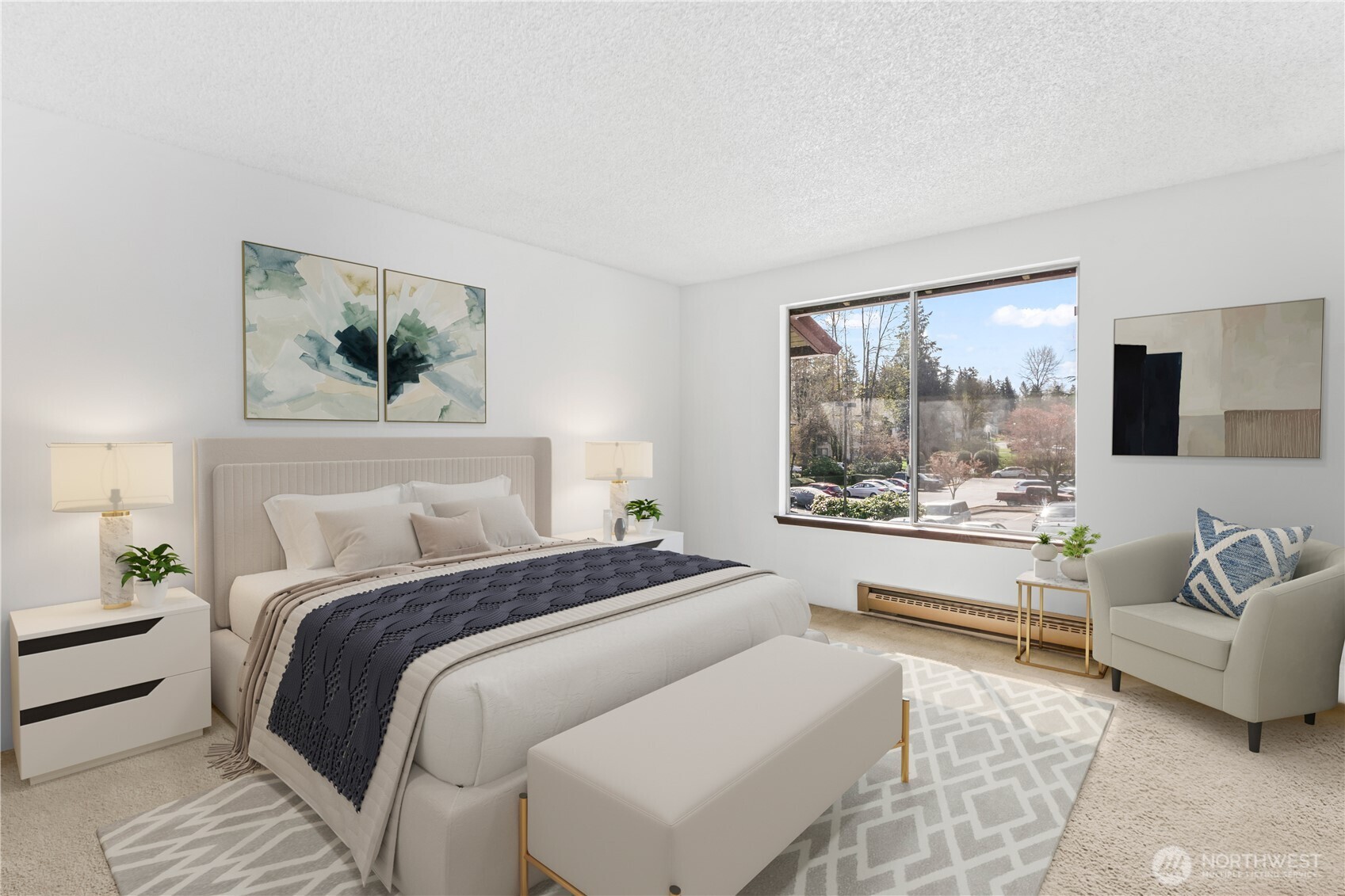 17529 151st Avenue Southeast, Unit 711 Renton, WA 98058 - Photo 16 of 25 a bedroom with a large bed and a couch
