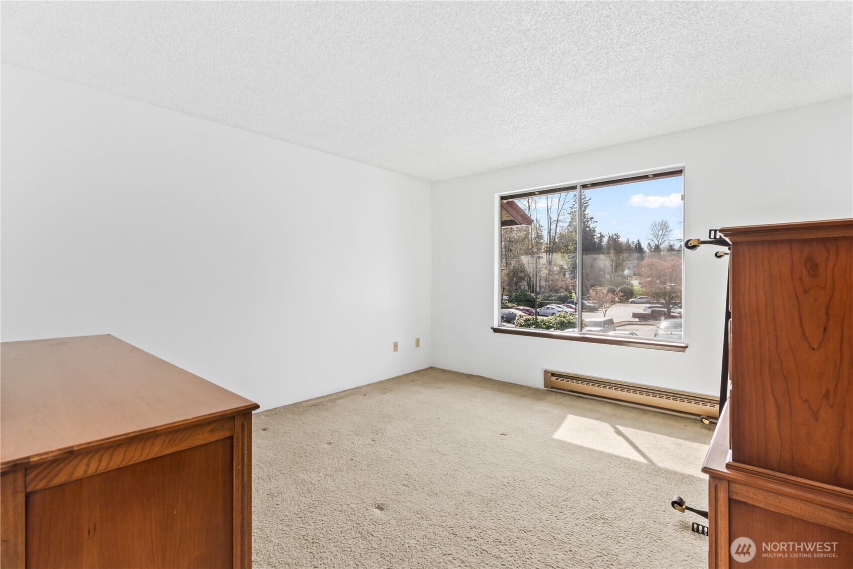 17529 151st Avenue Southeast, Unit 711 Renton, WA 98058 - Photo 17 of 25 a view of an empty room with a window