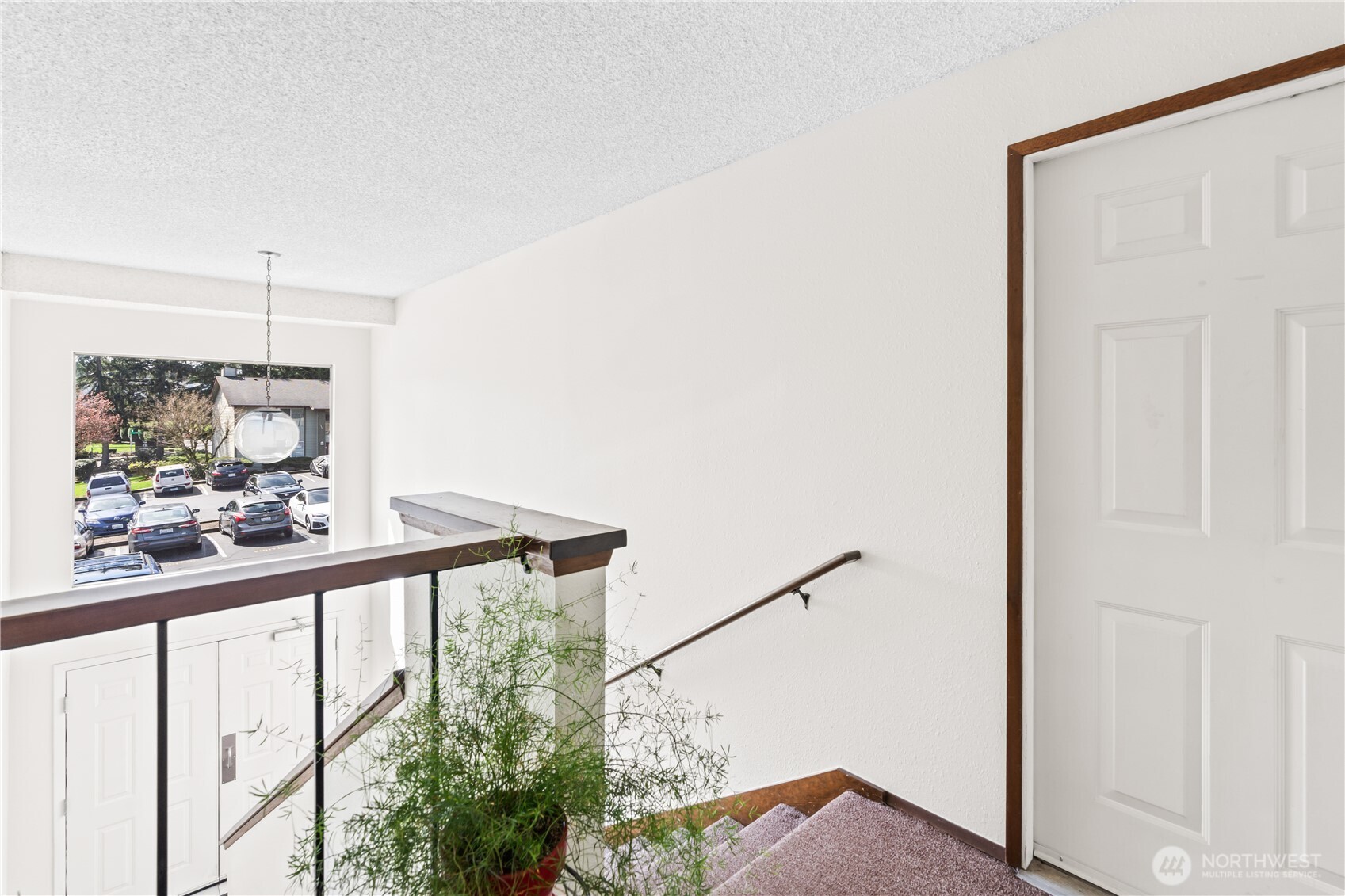 17529 151st Avenue Southeast, Unit 711 Renton, WA 98058 - Photo 4 of 25 a view of a balcony and car swing