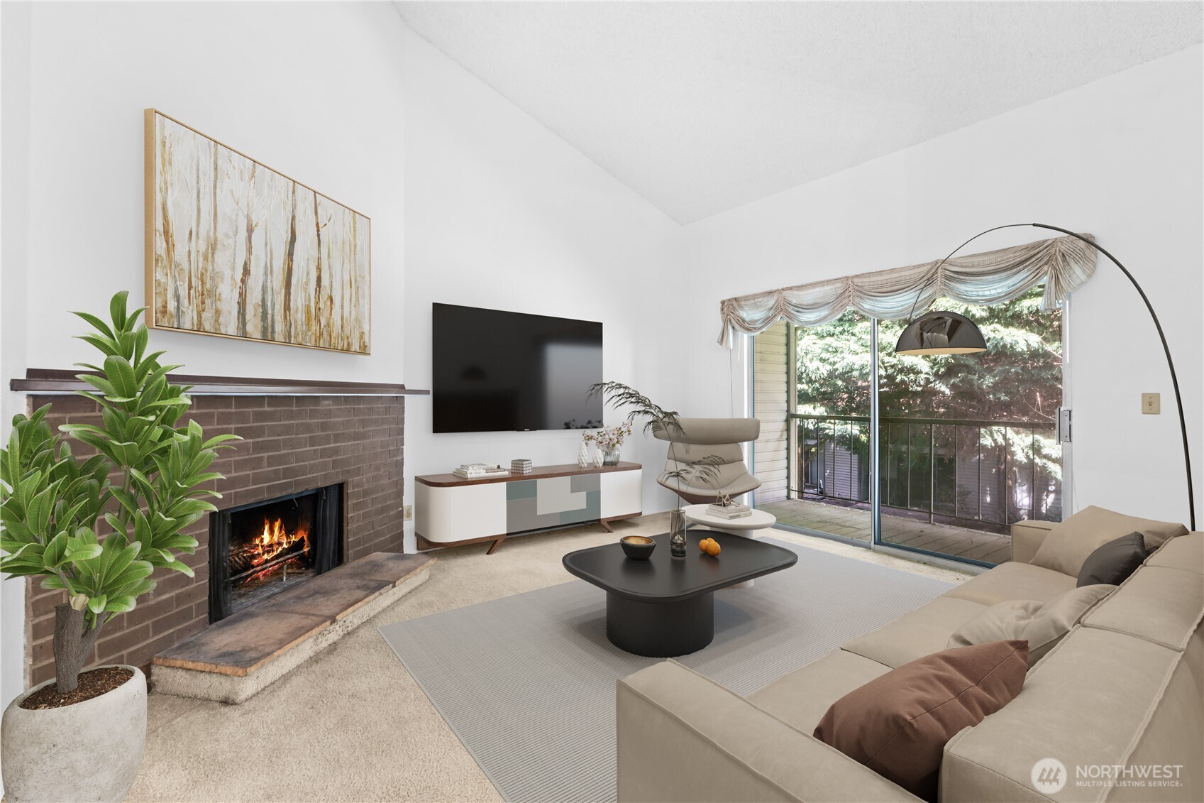 17529 151st Avenue Southeast, Unit 711 Renton, WA 98058 - Photo 6 of 25 a living room with furniture a fireplace and a flat screen tv