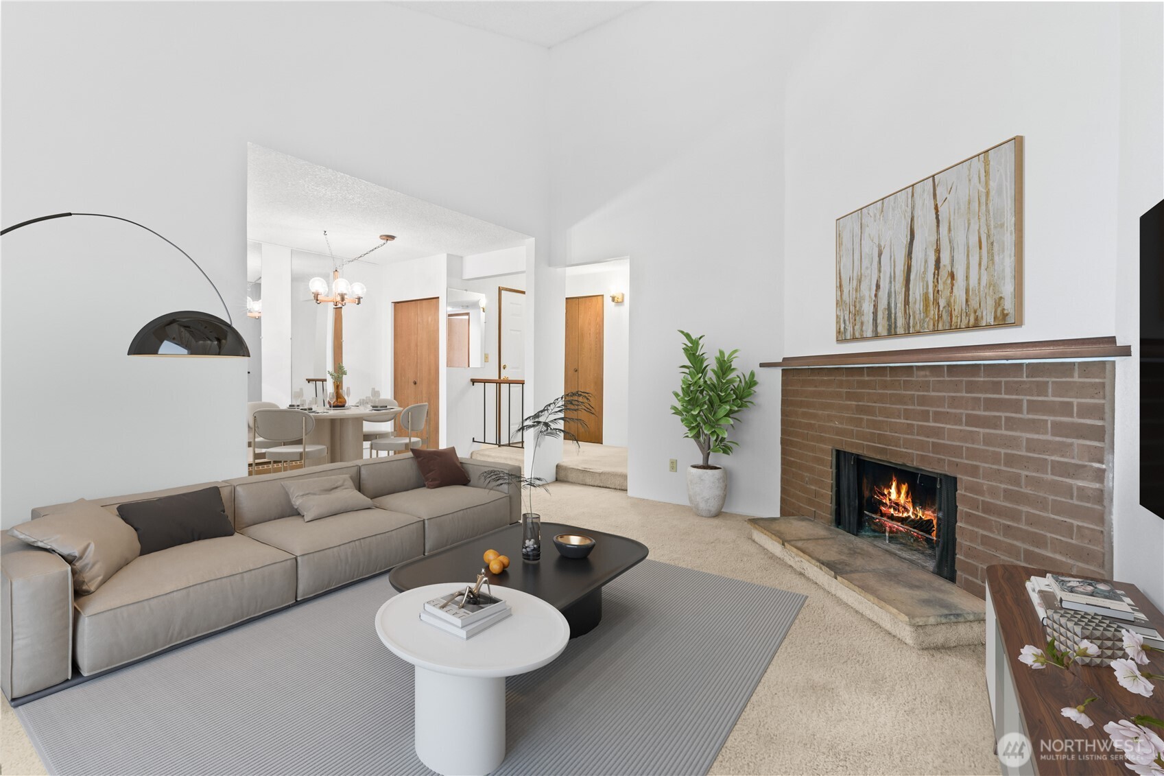 17529 151st Avenue Southeast, Unit 711 Renton, WA 98058 - Photo 8 of 25 a living room with furniture and a fireplace