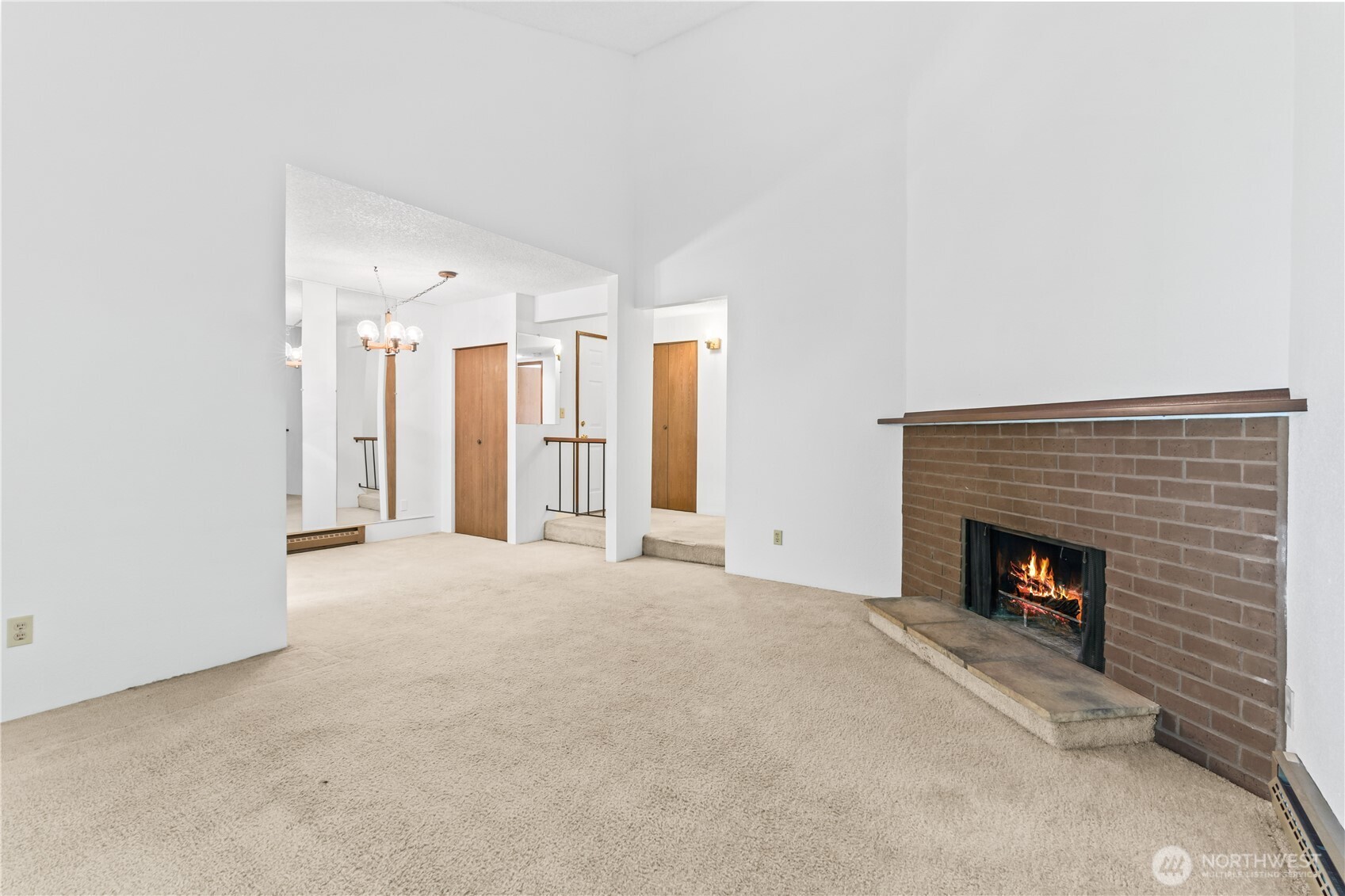17529 151st Avenue Southeast, Unit 711 Renton, WA 98058 - Photo 9 of 25 a view of empty room with fireplace