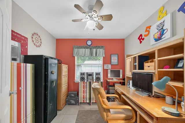 a view of a house with a backyard porch and sitting area