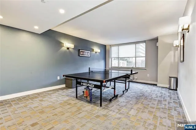 a view of a livingroom with furniture and window