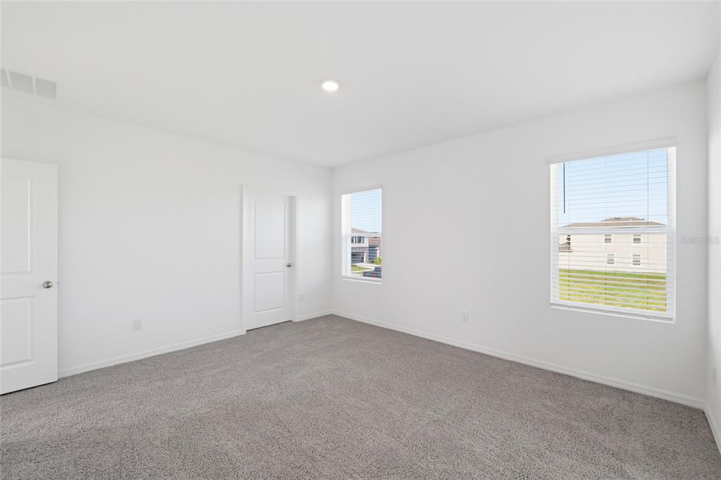 17786 Acorn Drop Road Land O Lakes, FL 34638 - Photo 25 of 50 an empty room with a window