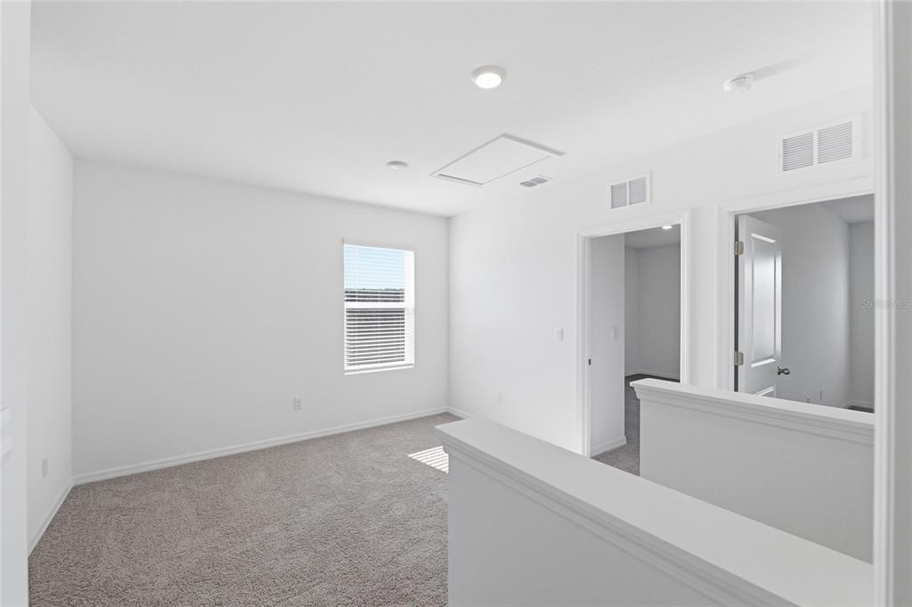 17786 Acorn Drop Road Land O Lakes, FL 34638 - Photo 30 of 50 a view of a livingroom with a staircase