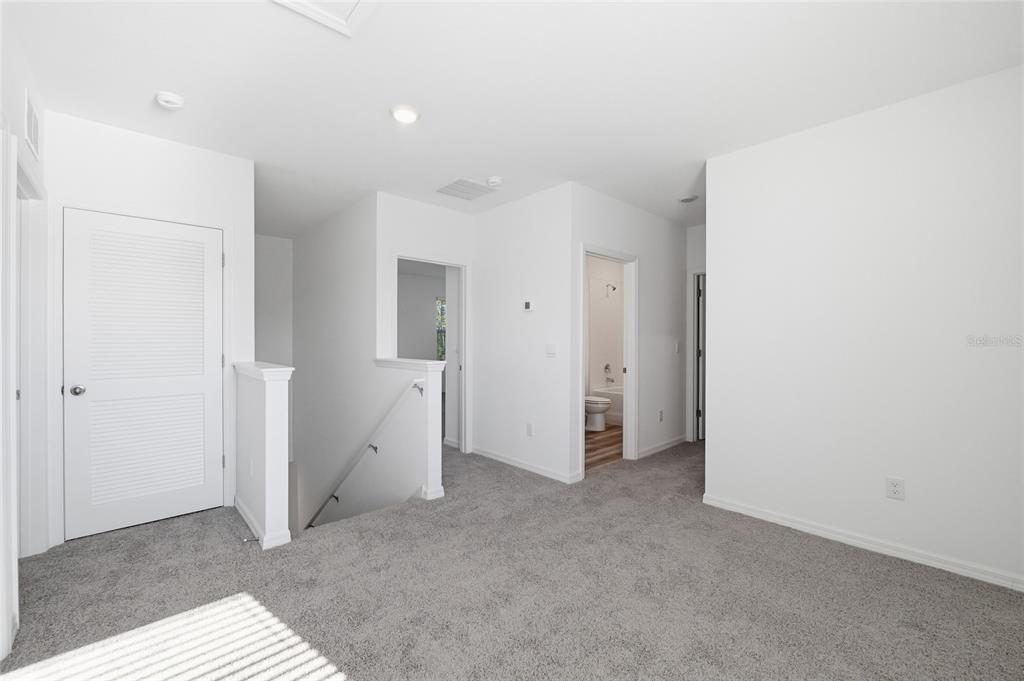 17786 Acorn Drop Road Land O Lakes, FL 34638 - Photo 31 of 50 an empty room with windows