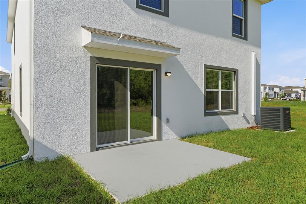 17786 Acorn Drop Road Land O Lakes, FL 34638 - Photo 42 of 50 front view of a house with a yard