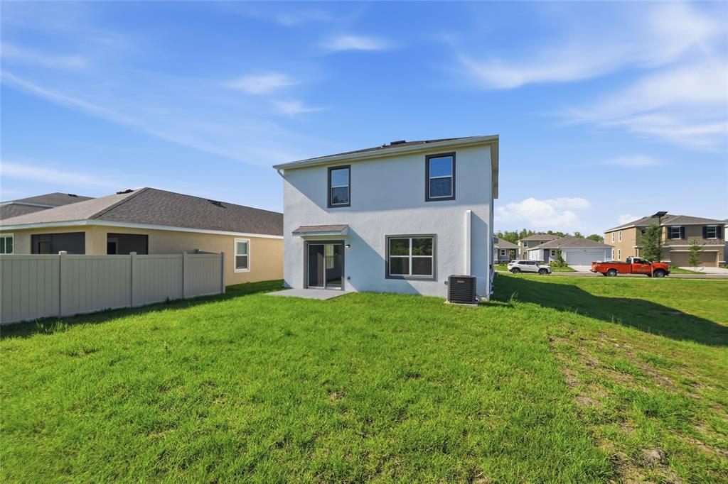 17786 Acorn Drop Road Land O Lakes, FL 34638 - Photo 47 of 50 a house view with a garden space