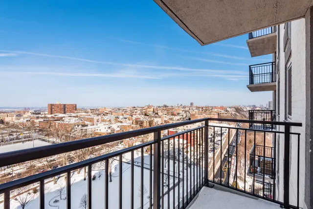 a view of city from a balcony