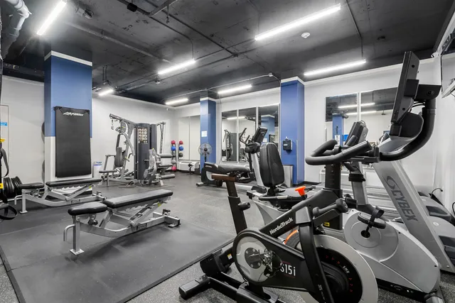 a view of a room with gym equipment