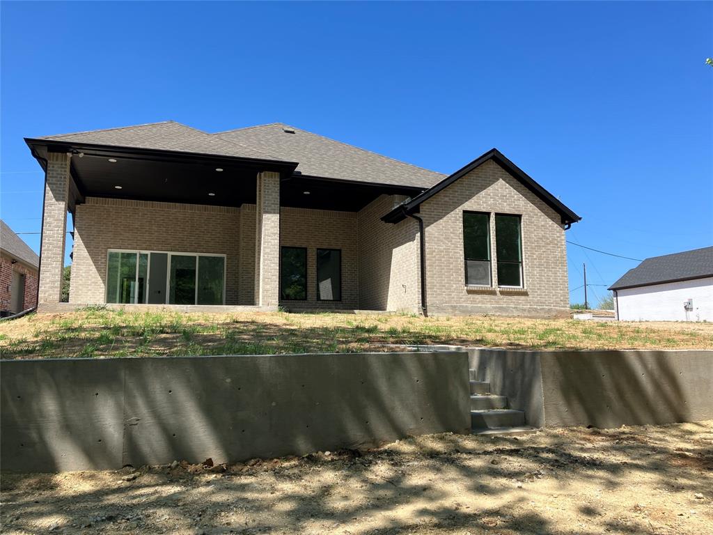 42101 Crooked Stick Drive Whitney, TX 76692 - Photo 2 of 27 a view of a house with a swimming pool