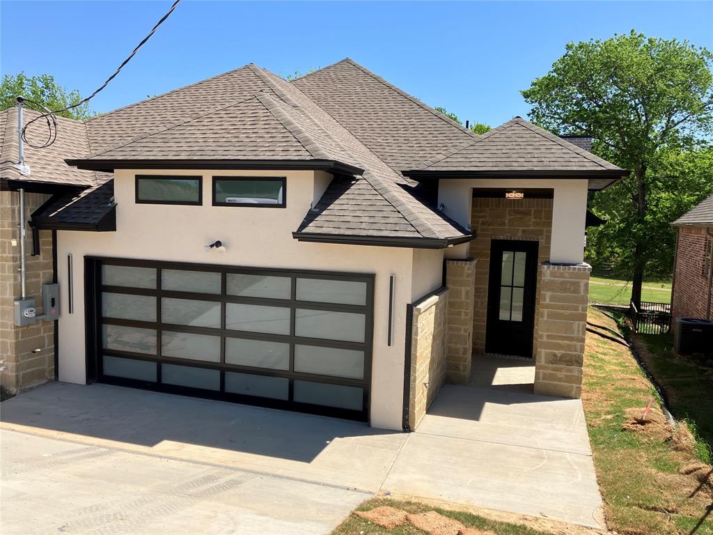 42101 Crooked Stick Drive Whitney, TX 76692 - Photo 21 of 27 a front view of a house with a garage