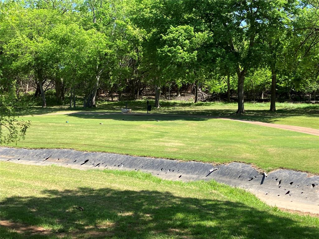 42101 Crooked Stick Drive Whitney, TX 76692 - Photo 24 of 27 a view of a swimming pool with an outdoor space and seating area