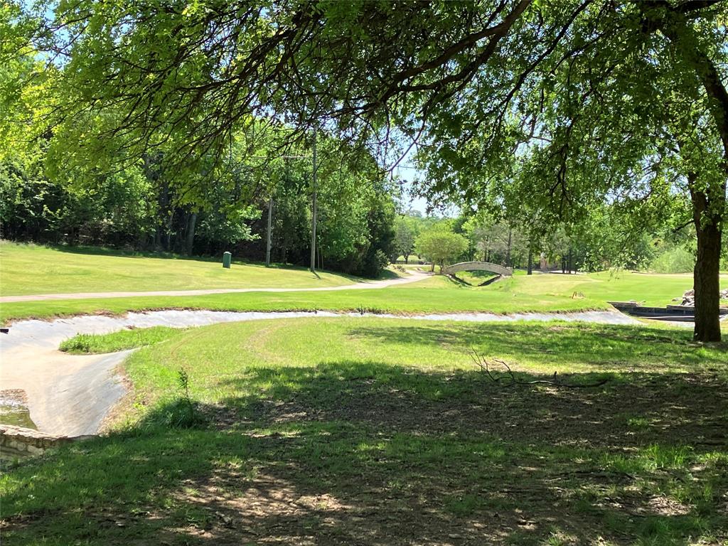 42101 Crooked Stick Drive Whitney, TX 76692 - Photo 26 of 27 a view of a golf course with a lake view