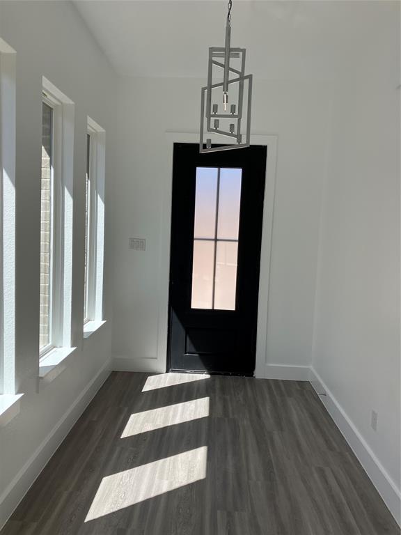 42101 Crooked Stick Drive Whitney, TX 76692 - Photo 8 of 27 a view of entryway with wooden floor and door