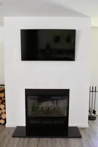 a living room with a fireplace