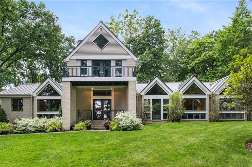 139 Witherow Road Sewickley, PA 15143 - Photo 1 of 41 a front view of a house with a yard and porch