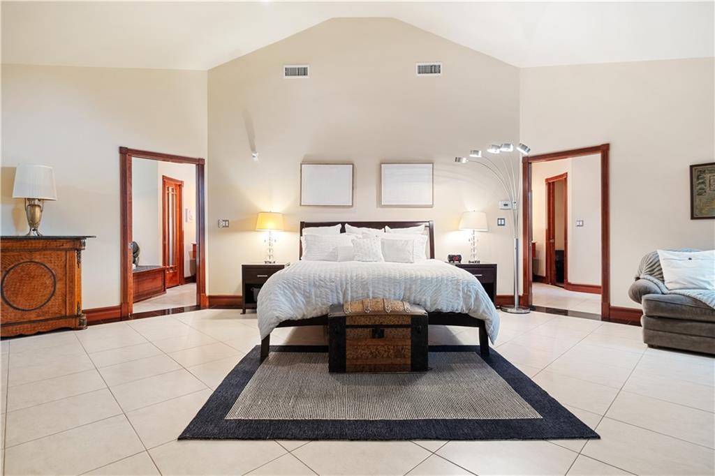 139 Witherow Road Sewickley, PA 15143 - Photo 17 of 41 a spacious bedroom with a bed a couch and dresser