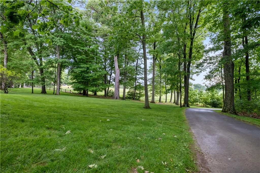 139 Witherow Road Sewickley, PA 15143 - Photo 38 of 41 a view of grassy field with benches