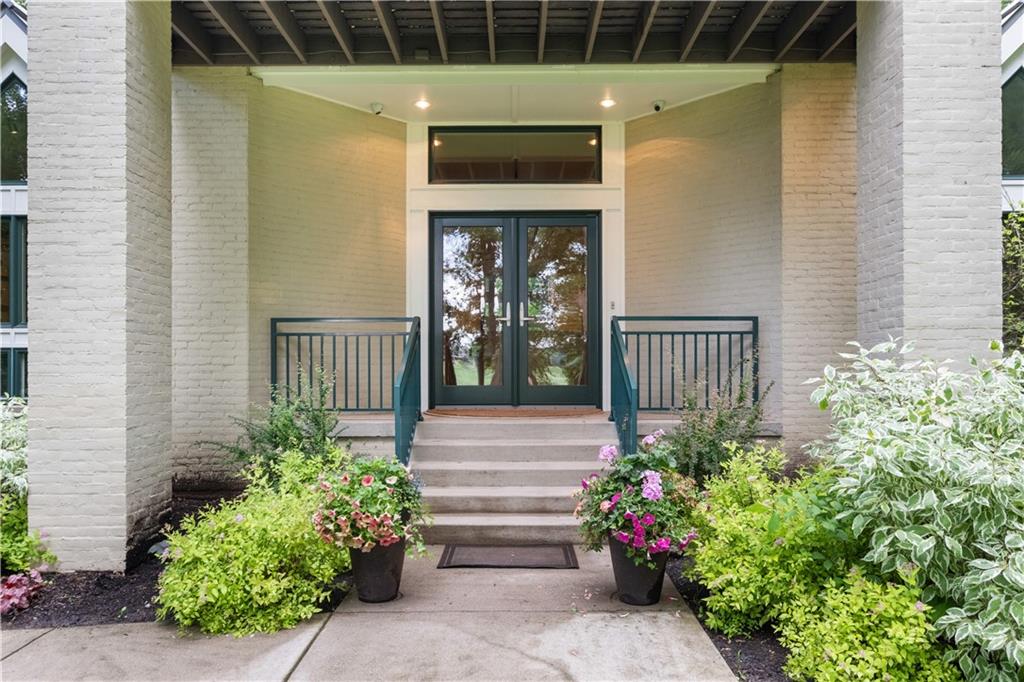 139 Witherow Road Sewickley, PA 15143 - Photo 4 of 41 a view of a house with a small yard and plants