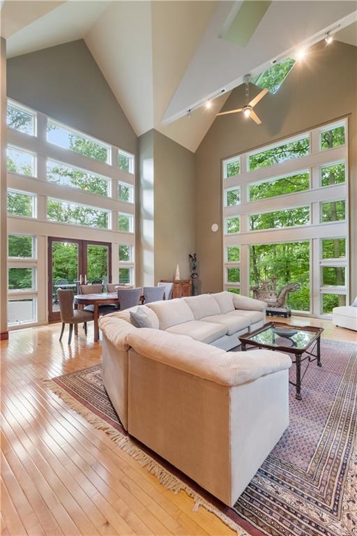 139 Witherow Road Sewickley, PA 15143 - Photo 6 of 41 a living room with furniture and large windows