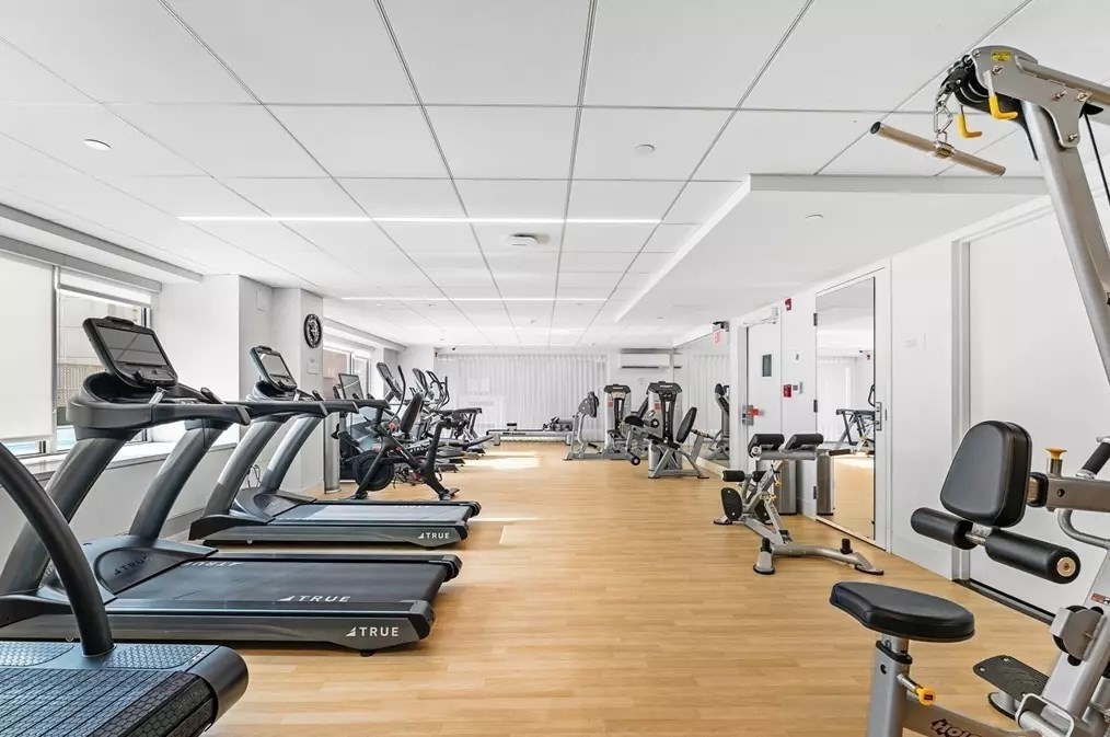 151 Tremont Street, Unit 24U Boston, MA 02111 - Photo 22 of 29 a view of a room with gym equipment