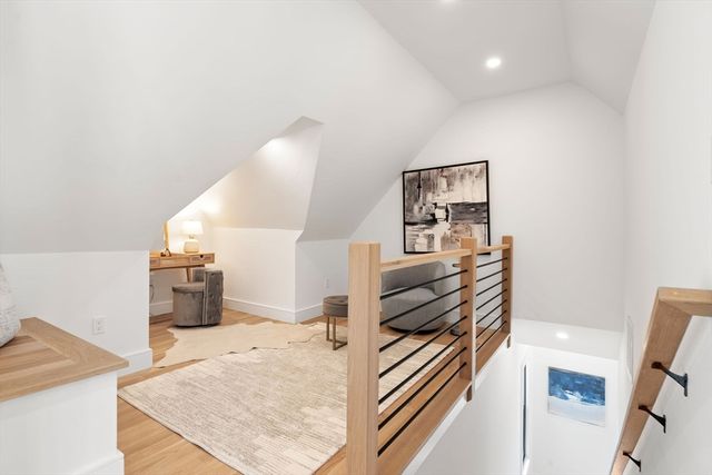 a view of a living room and workspace