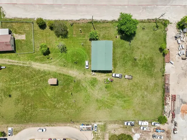 a kitchen with a sink stove and refrigerator