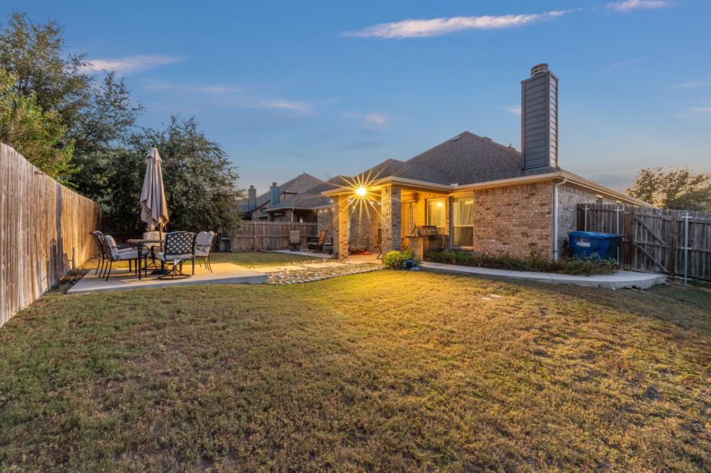 201 Whitman Drive McKinney, TX 75072 - Photo 22 of 33 a view of a house with a yard