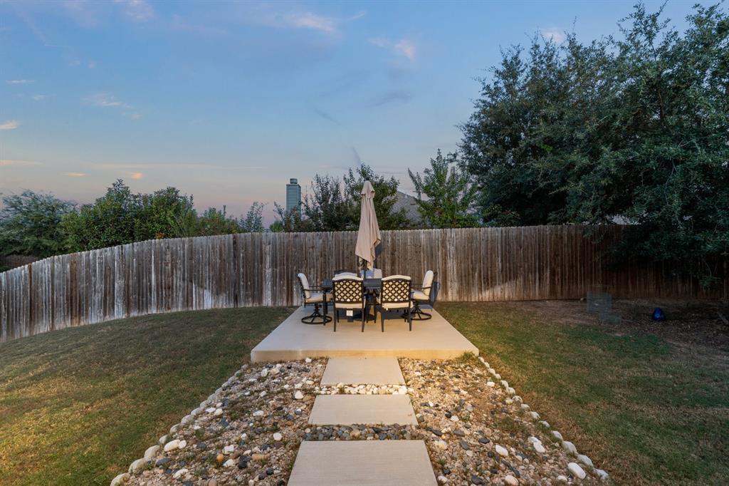 201 Whitman Drive McKinney, TX 75072 - Photo 3 of 33 a view of a back yard of the house