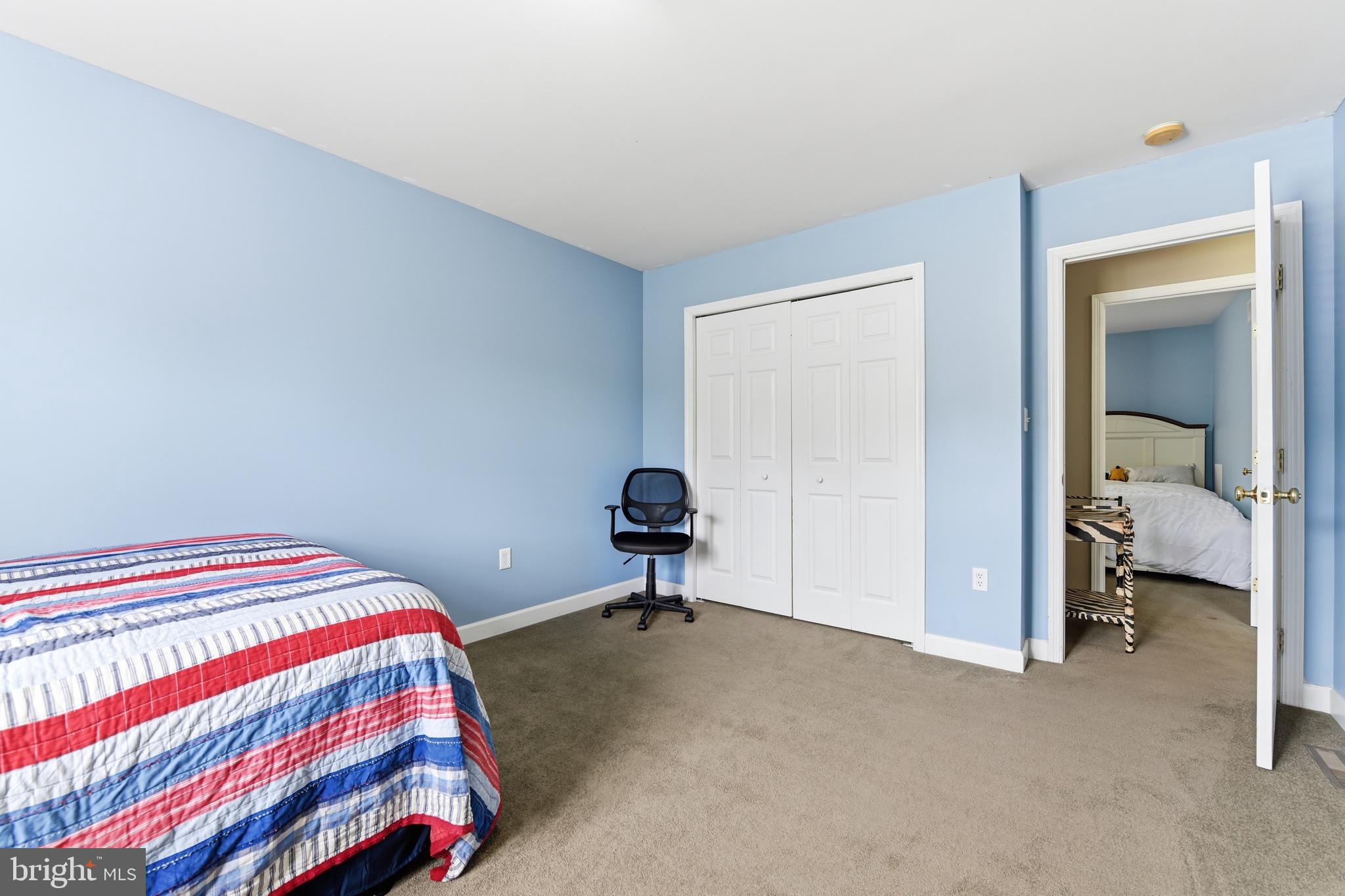 3121 South Wagner Circle Sinking Spring, PA 19608 - Photo 24 of 30 a bedroom with a bed and a lamp