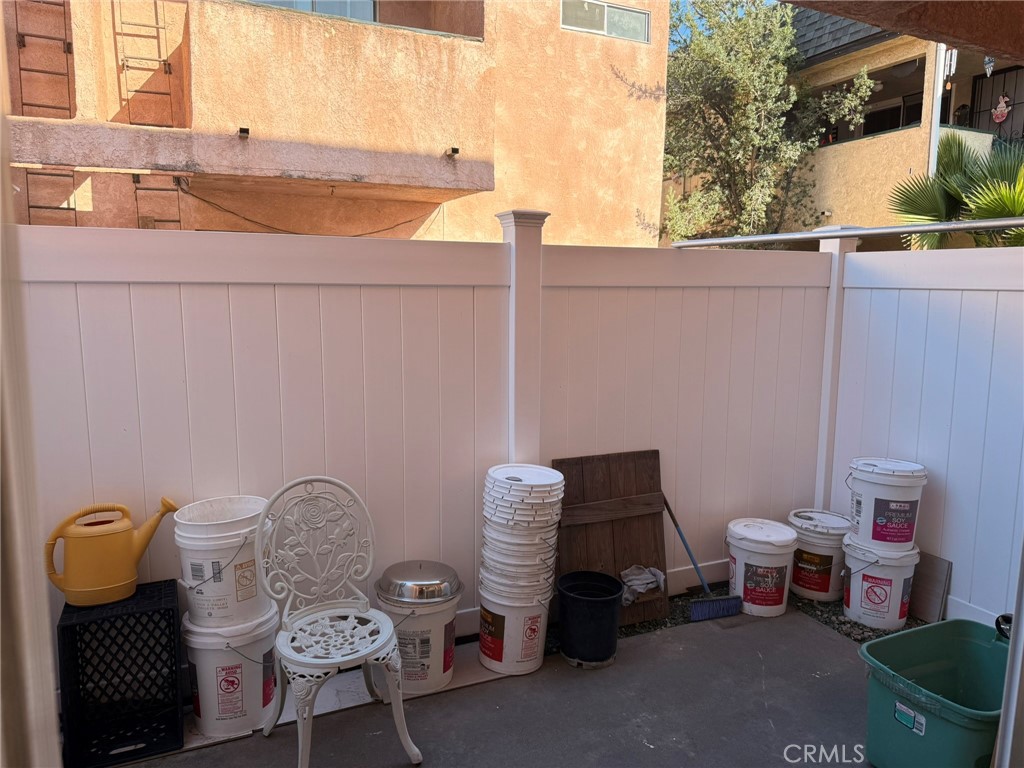 11829 Ferris Road, Unit E El Monte, CA 91732 - Photo 6 of 10 a backyard of a house with table and chairs