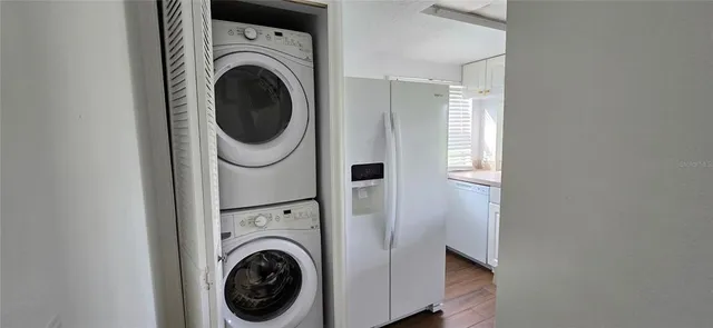 a utility room with dryer and washer