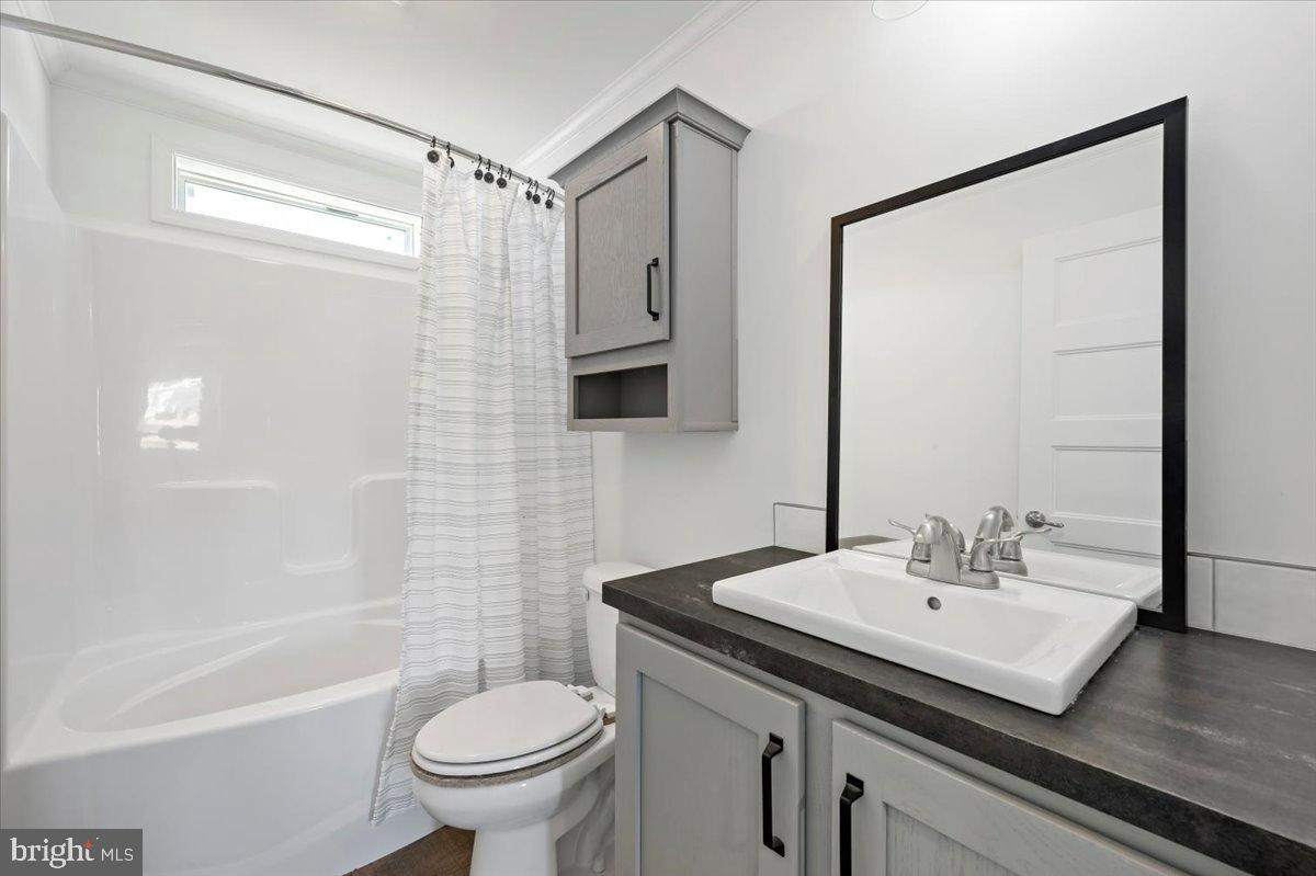 1412 Heytesbury Road Walnutport, PA 18088 - Photo 30 of 39 a bathroom with a sink toilet and shower