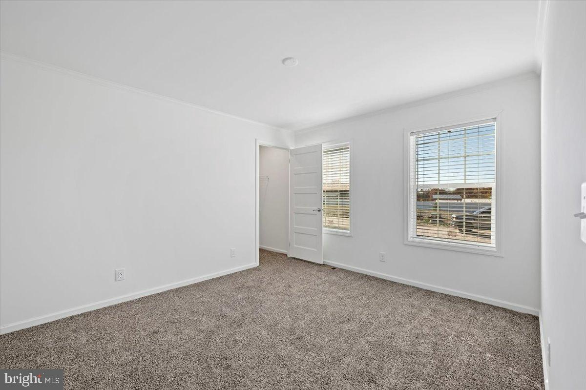 1412 Heytesbury Road Walnutport, PA 18088 - Photo 31 of 39 an empty room with windows